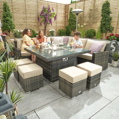 Cambridge Deluxe Corner Rattan Lounge Dining Set with 4 Stools - Square Gas Fire Pit Table in Brown Rattan