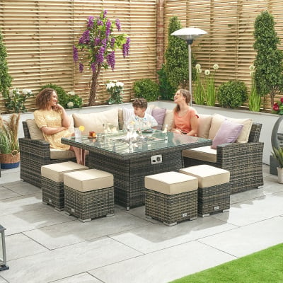 Cambridge Deluxe Corner Rattan Lounge Dining Set with 4 Stools - Square Gas Fire Pit Table in Brown Rattan