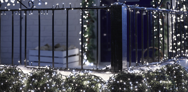 Cool White Cluster Lights Outside A Home