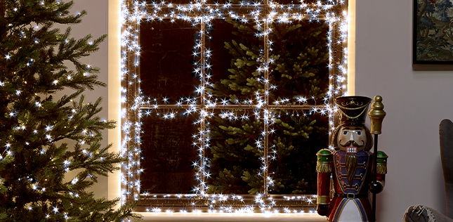 Christmas cluster LED lights on a window