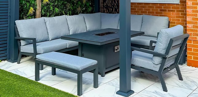 Metal corner sofa with dining chair and a fire pit table