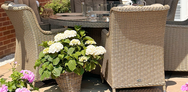 Rattan dining table and chairs with fire pit table